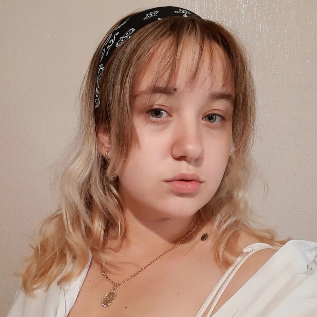 Мила